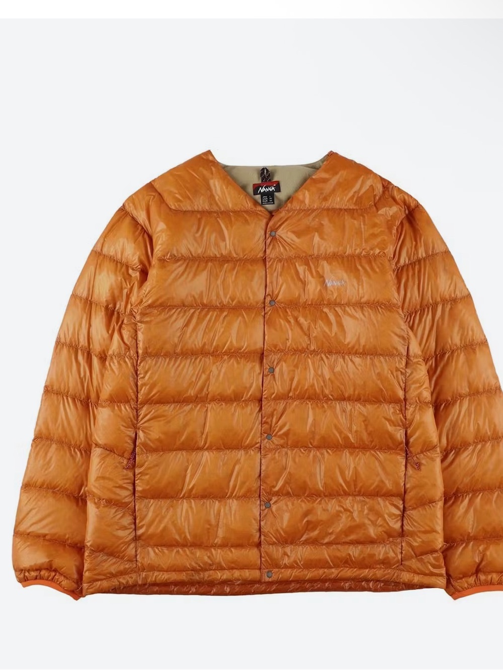 A down cardigan from a renowned outdoors Japanese brand - Nanga